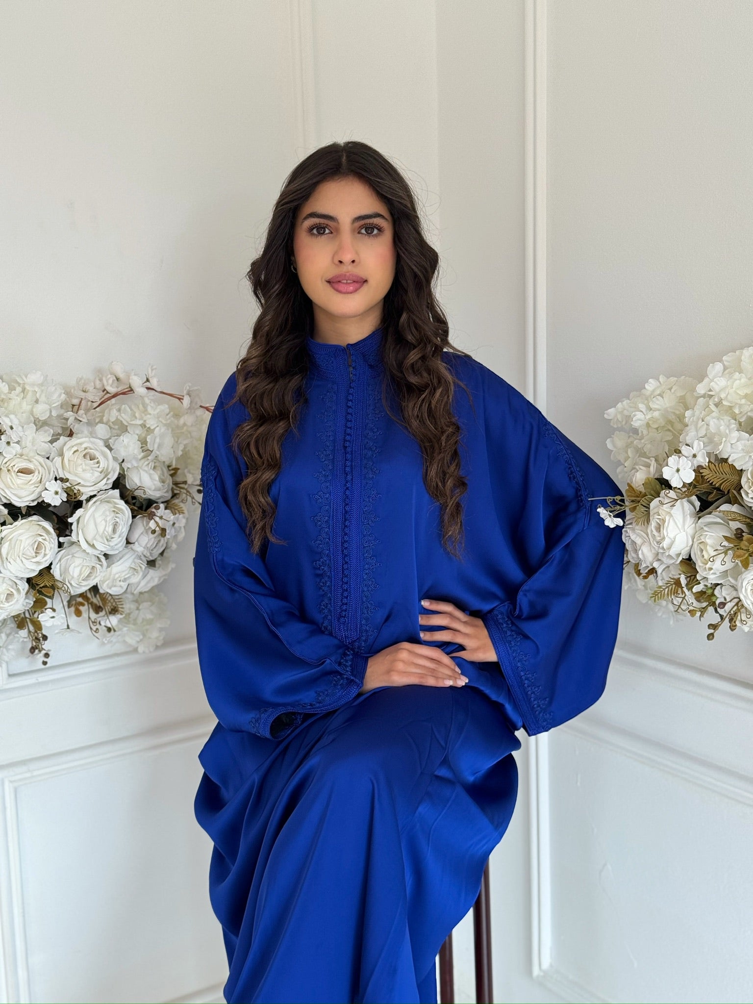 Detailed shot of Gandoura Senna embroidery and silk Arabic sfifa.