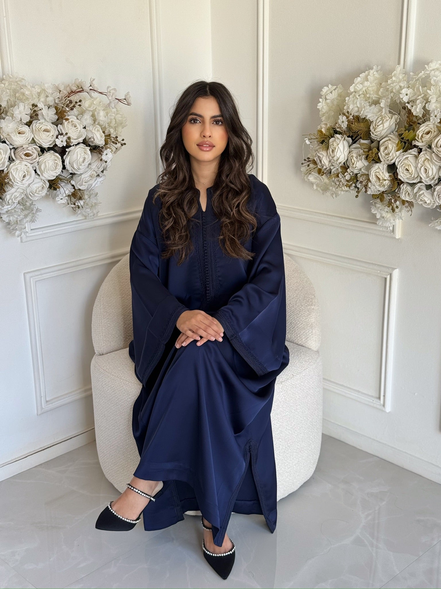 Full view of navy Moroccan gandoura with flowy fit and luxury details