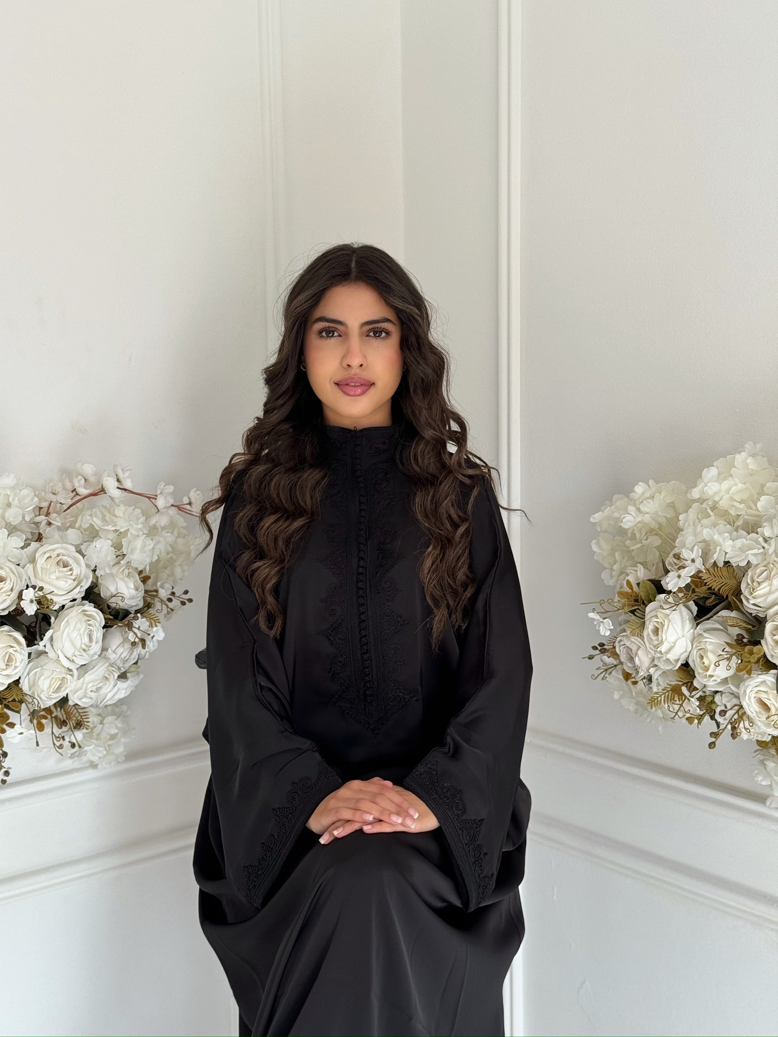 Model wearing Gandoura Yasmin Moroccan satin caftan, handmade by Imane Belhaj.
