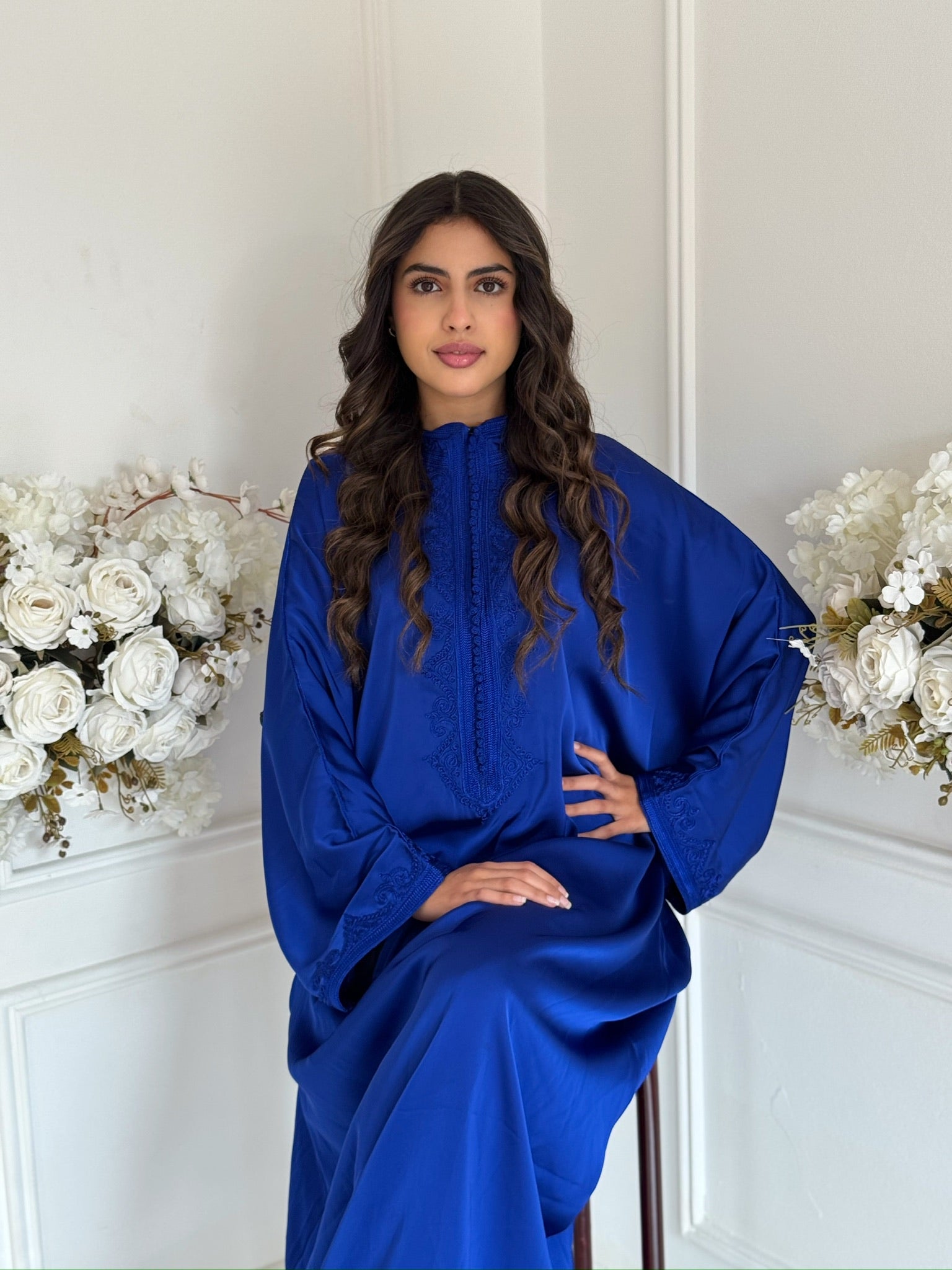 Model wearing Moroccan Gandoura Niama satin caftan dress by Imane Belhaj.